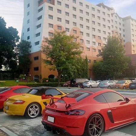 The Heritage Chiang Rai Hotel And Convention Exterior photo Porsche Cayman GT4 (rear)